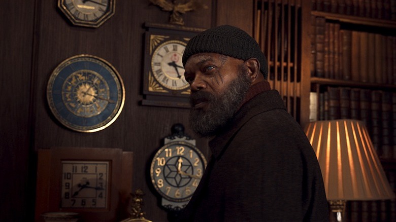 Nick Fury contemplating in front of various clocks in Secret Invasion (2023)