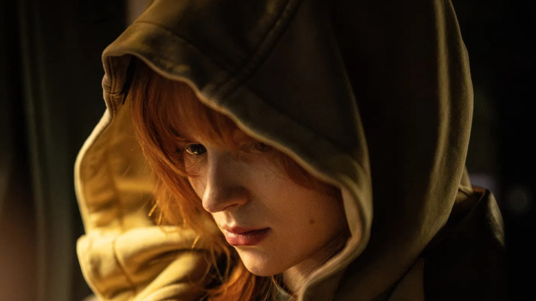 Jean looking down in a hood in Spider-Man: Brand New Day