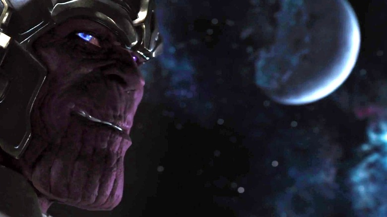 Thanos (Damion Poitier) grinning in The Avengers