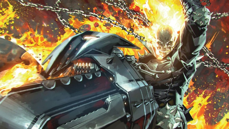 Ghost Rider, aflame and chains in hand, tears through on his bike on the cover of Ghost Rider Unchained