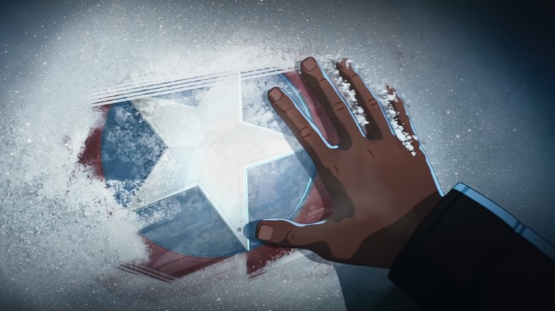 Hand on Captain America's shield