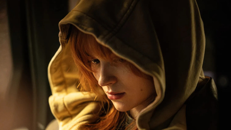 Jean looking down in a hood in Spider-Man: Brand New Day
