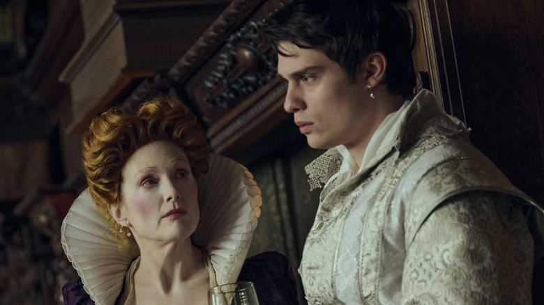 Mary looks at George in the royal court in 