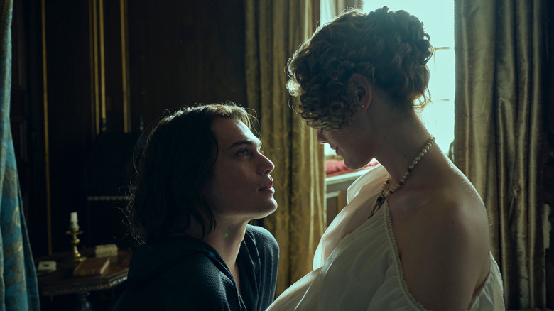 George looks up lovingly at Katherine in "Mary & George" (2024)