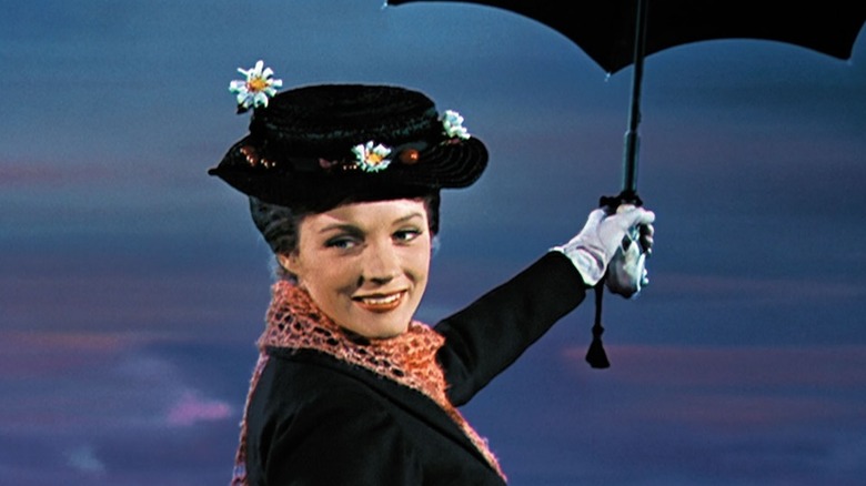 Mary Poppins holding an umbrella