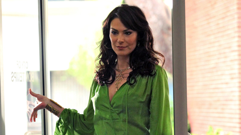 Marynnn stands in a doorway on "True Blood"