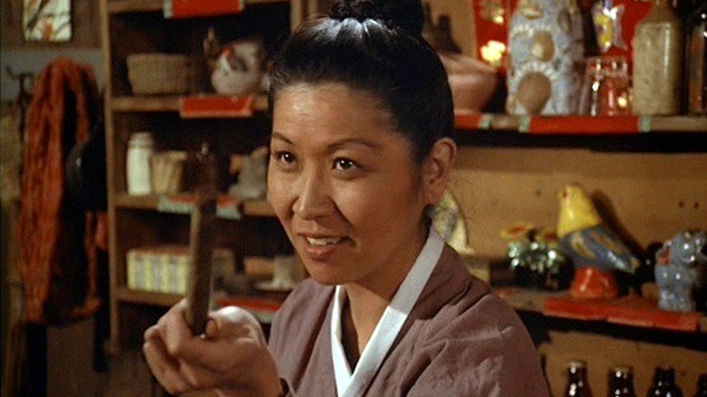 Rosie holding stick on "M*A*S*H"