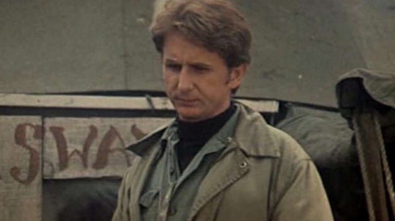 Father Mulcahy looks concerned in "M*A*S*H" (1970)
