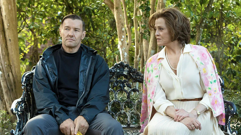 Narvel and Mrs. Haverhill sitting on a bench