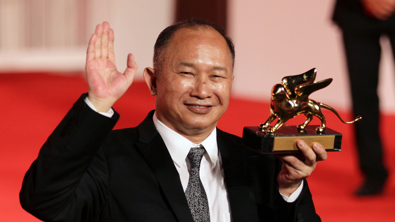 John Woo with his golden Lion at the 2010 Cannes Film Festival