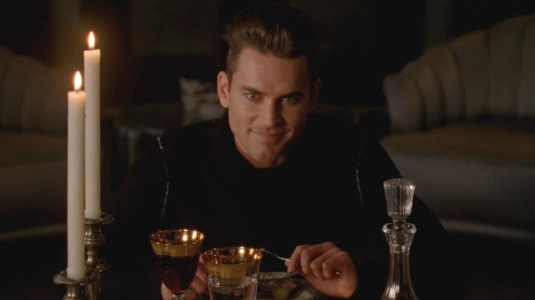 Matt Bomer eating in AHS: Hotel