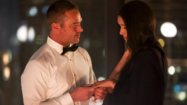 Severide giving Kidd a ring 