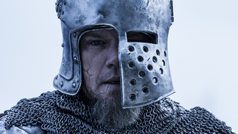 Matt Damon wearing jousting armor helmet The Last Duel