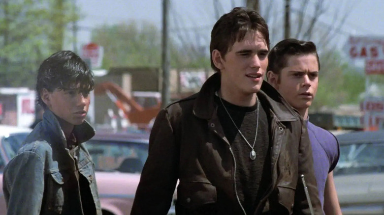 Ponyboy, Johnny, and Dallas in The Outsiders