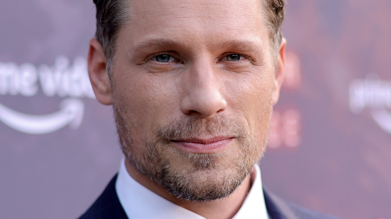 Matt Lauria smirking