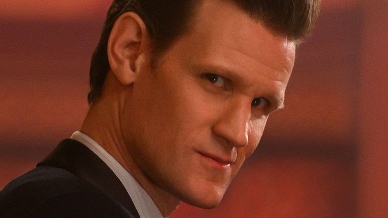 Matt Smith stares across bar