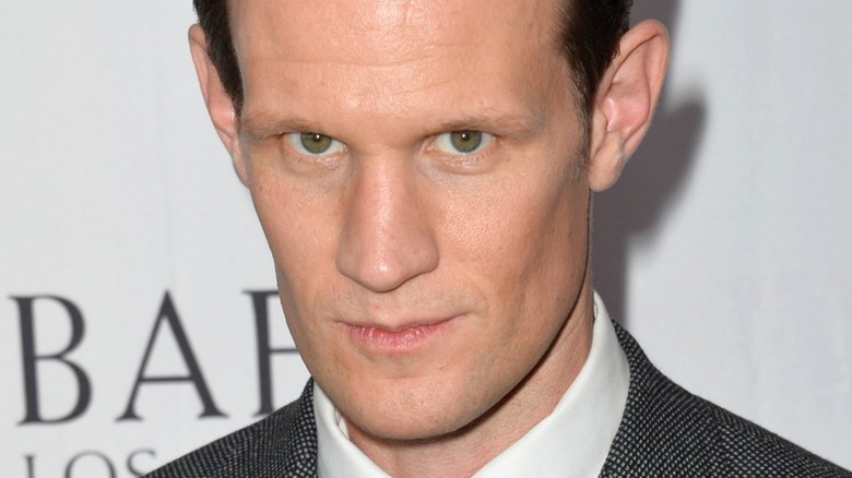 Matt Smith grimacing on red carpet