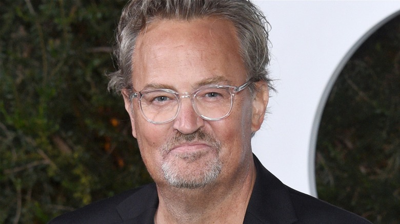 Matthew Perry wearing glasses