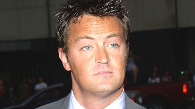 Matthew Perry expressionless