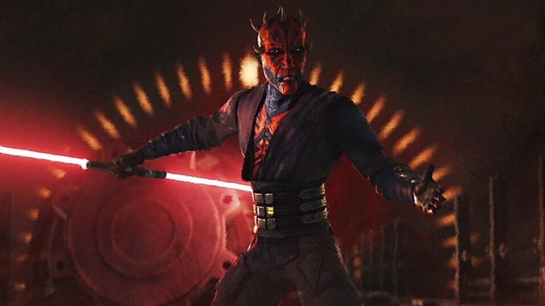 Maul grimacing and flaring his lightsaber in 
