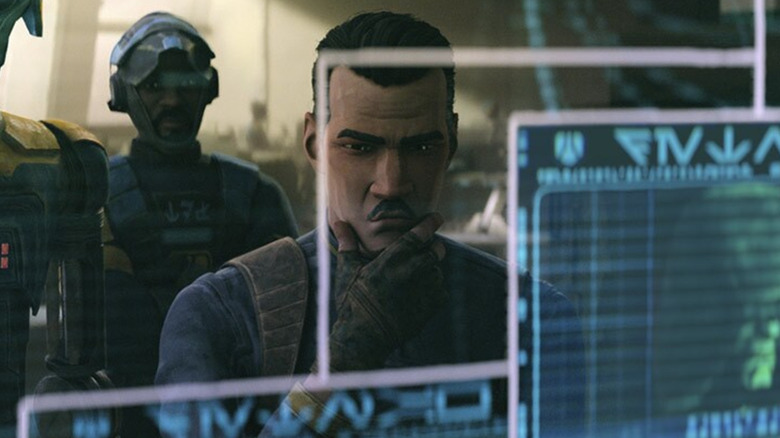 Brander Lawson studying a digital readout in "Star Wars: Maul — Shadow Lord" (2026)