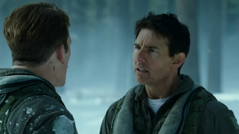 Maverick talks to Rooster in the snow