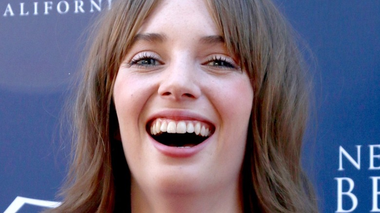 Maya Hawke laughing at an event
