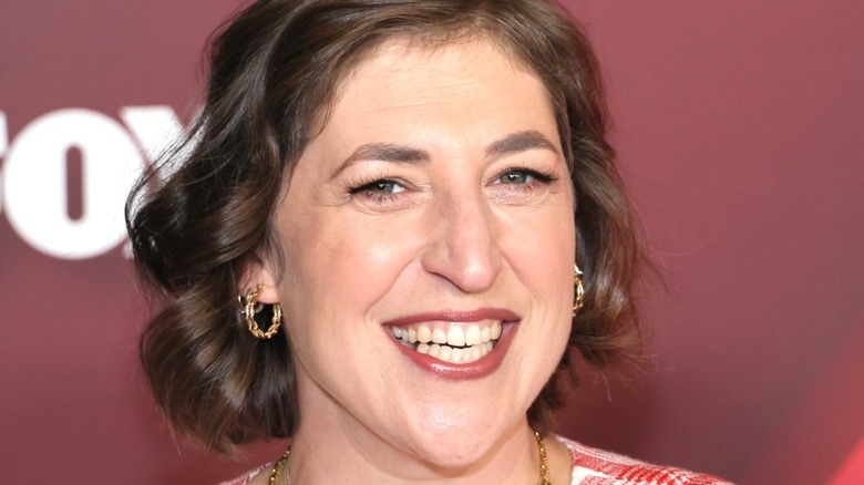 Mayim Bialik smiling at an event