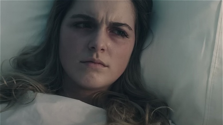 Esther frowning at Aunt Lydia