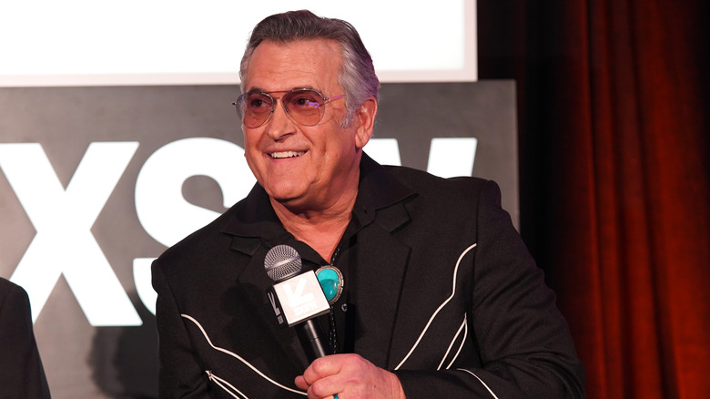 Bruce Campbell smiling during press panel