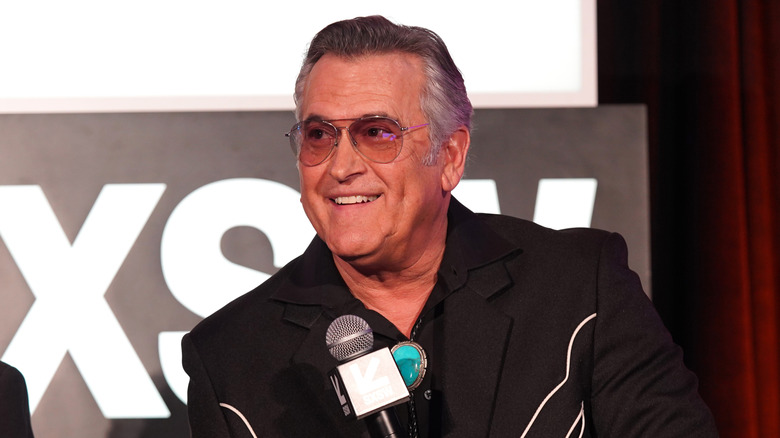 Bruce Campbell smiling during press panel