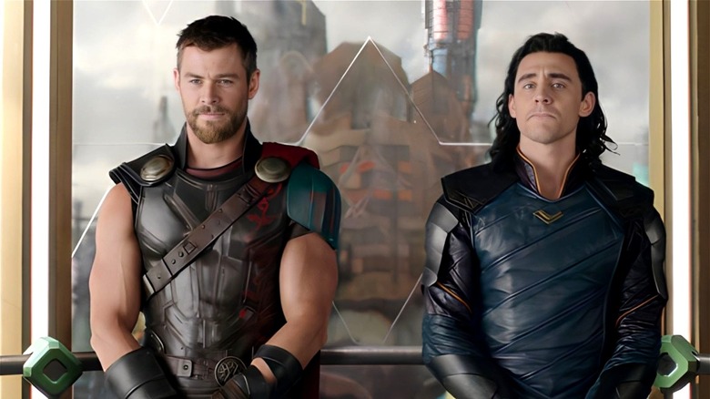 Thor stands next to Loki