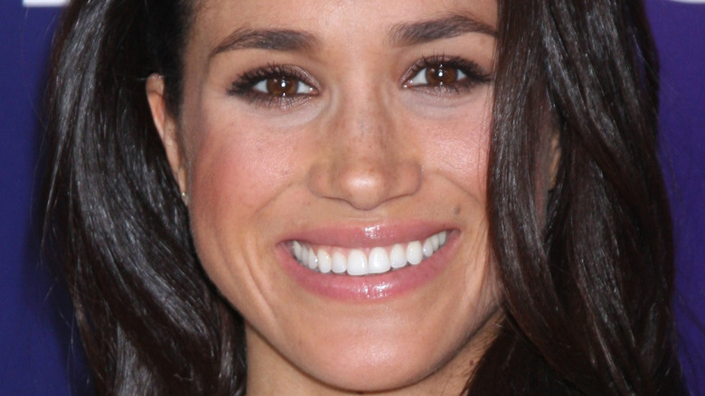 Meghan Markle at event smiling