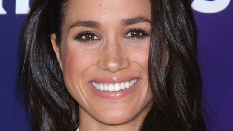 Meghan Markle at event smiling
