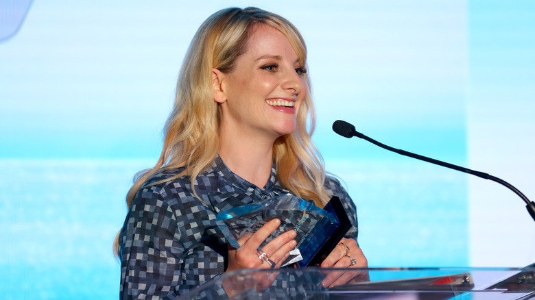 Melissa Rauch smiling during interview