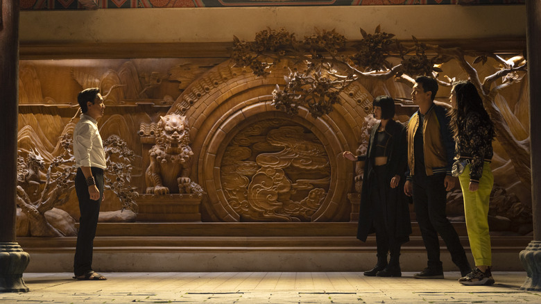 Wenwu addresses Xialing, Shang-Chi, and Katy