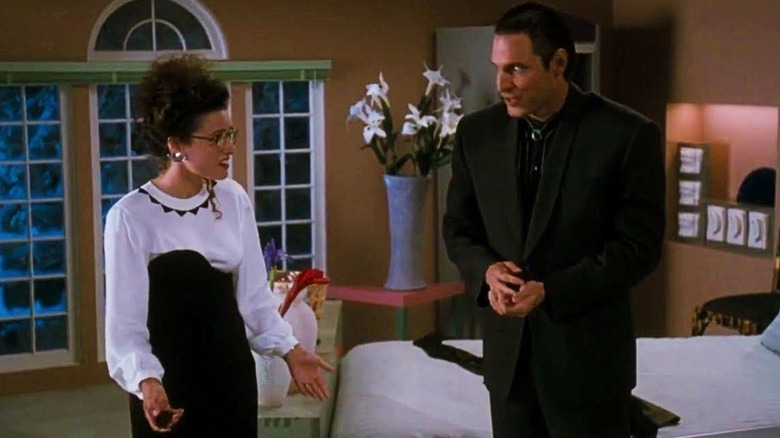 Nicholas Guest and Julia Louis-Dreyfus in Christmas Vacation