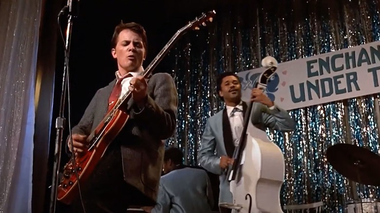 Marty McFly playing guitar on stage in Back to the Future (1985)