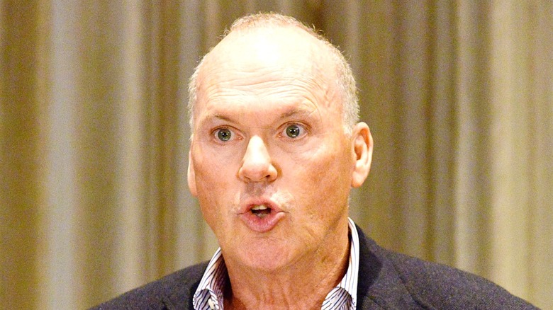 Michael Keaton speaking animatedly