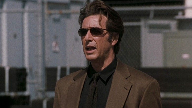 Vincent Hanna character wearing sunglasses in "Heat"