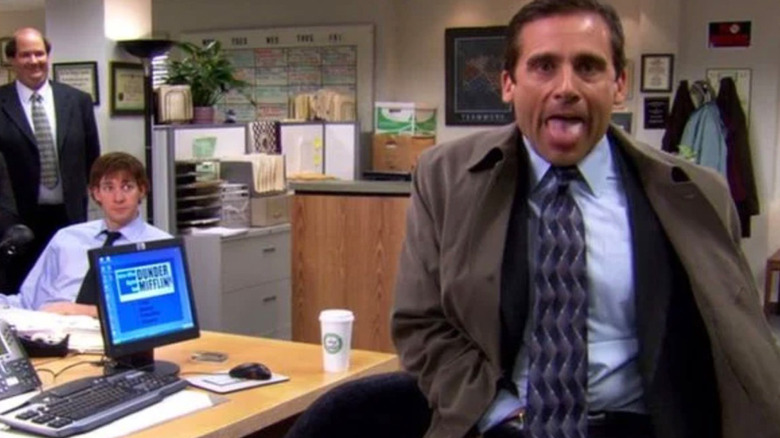 Michael pretending to flash employees