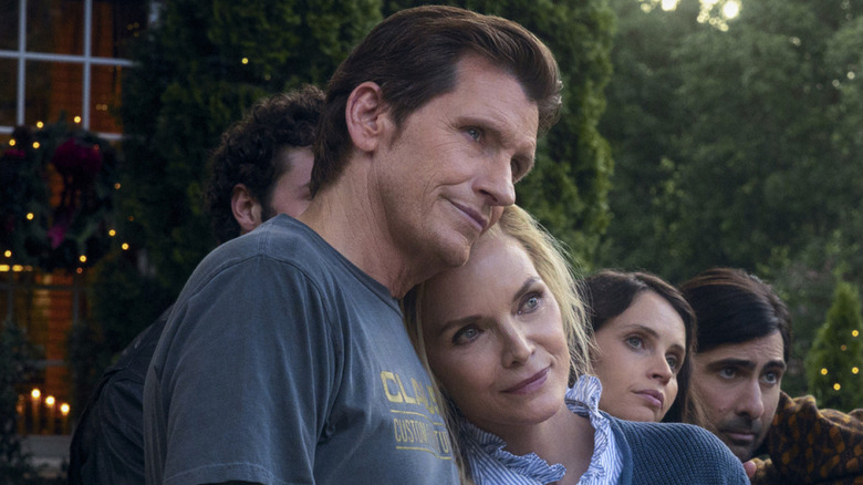 Nick and Claire Clauster and family members on their front lawn in "Oh. What. Fun." (2025)