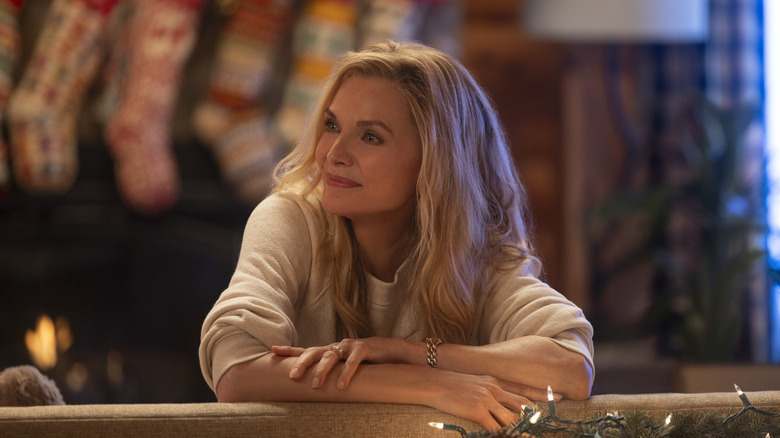 Claire surrounded by the Christmas paraphernalia she put up in 