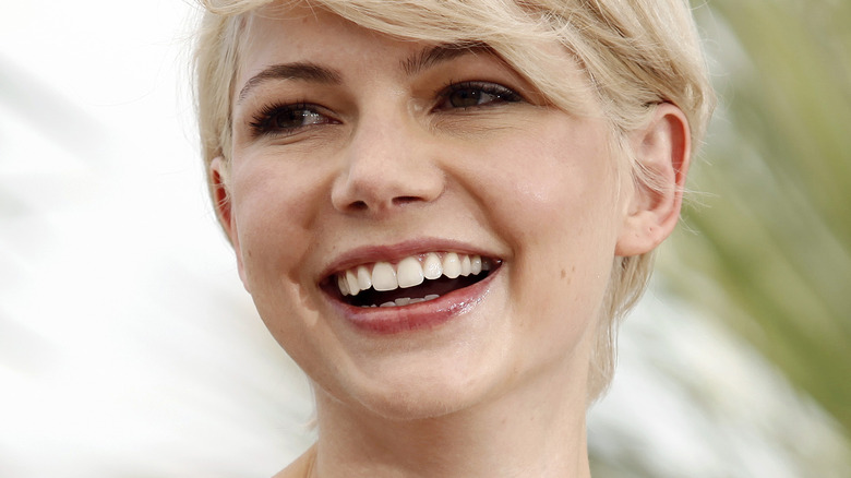 Michelle Williams smiles