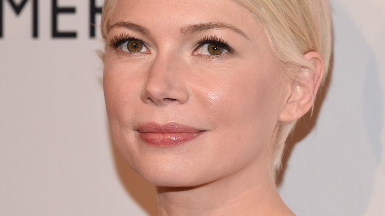 Michelle Williams smiles