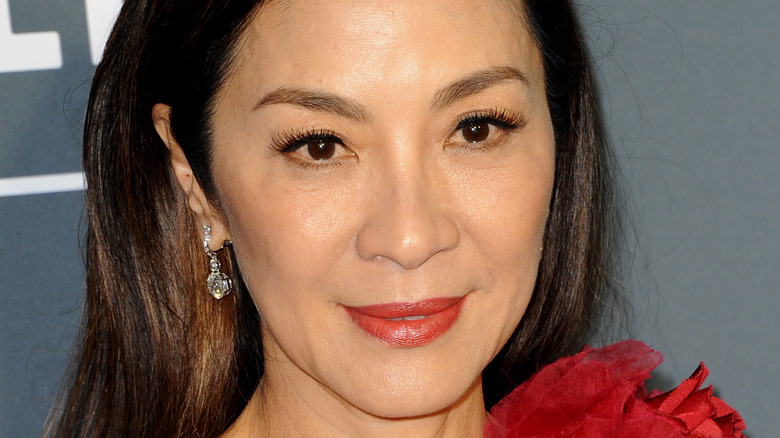 Michelle Yeoh smiling on red carpet