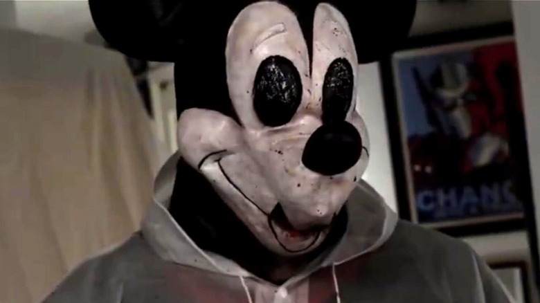 Mickey wears a rain slicker in The Mouse Trap (2024)