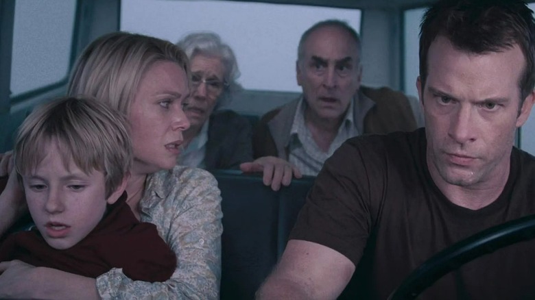 Amanda Dumfries, David Drayton, Billy Drayton, Dan Miller, and Irene Reppler looking horrified in The Mist