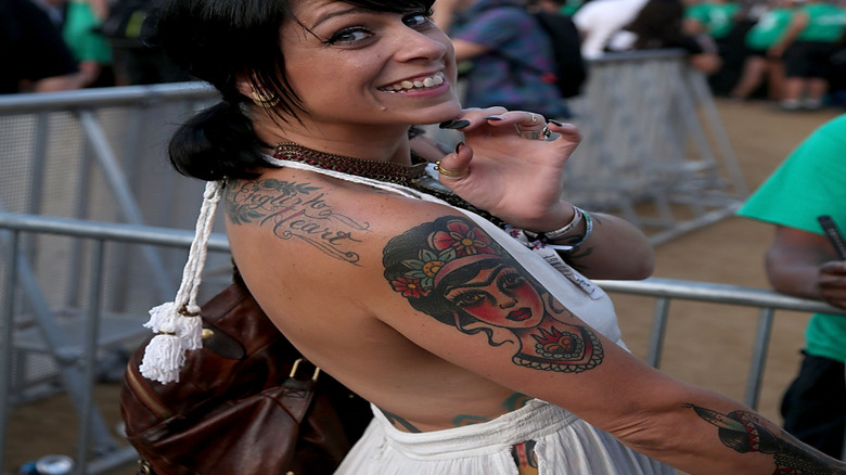 Danielle Colby smiling at concert