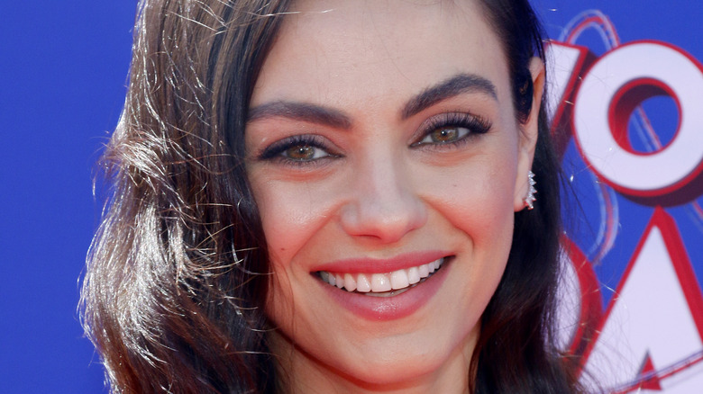 Mila Kunis smiling